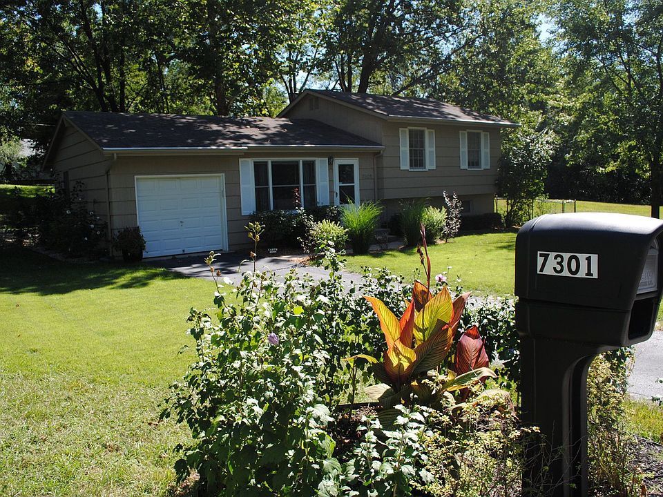 front with beautiful landscaping