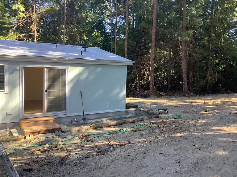 Landscaping and covered deck area to come!