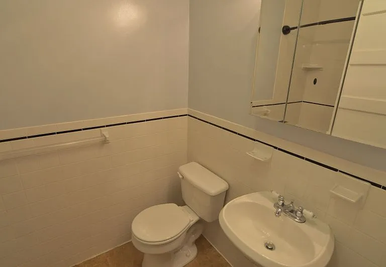hallway bathroom on third floor / upper floor of unit