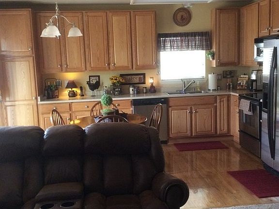 Kitchen
						:
						42" cabinets, stainless steel appliances, hard wood flooring