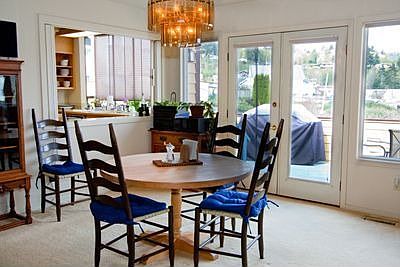 Large dining room with access to deck. 