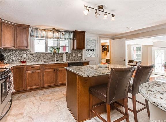 Remodeled kitchen with gran...