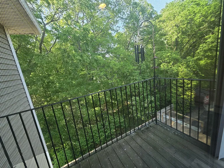 Private balcony w/ wooded & water view