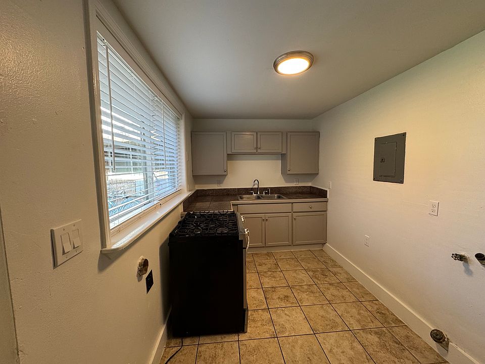 kitchen with gas stainless steel 5 burner stove