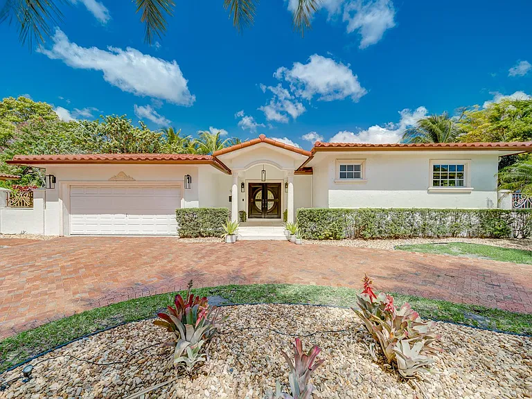 Circular driveway with two car garage