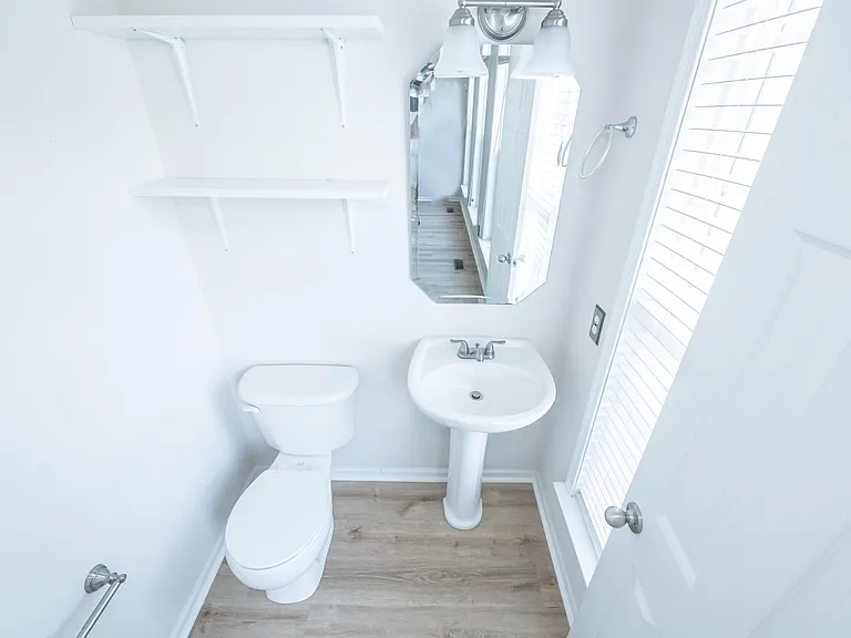 Second floor half bathroom for guests and convenience
