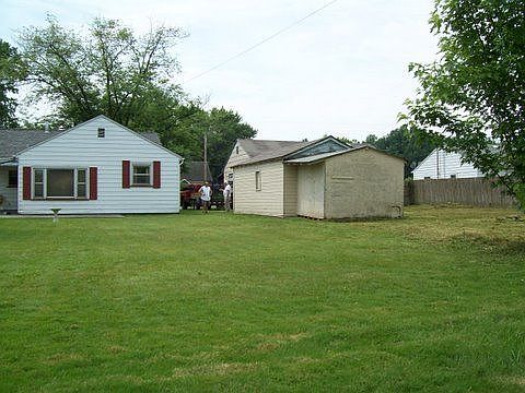 neighbors and back of garage