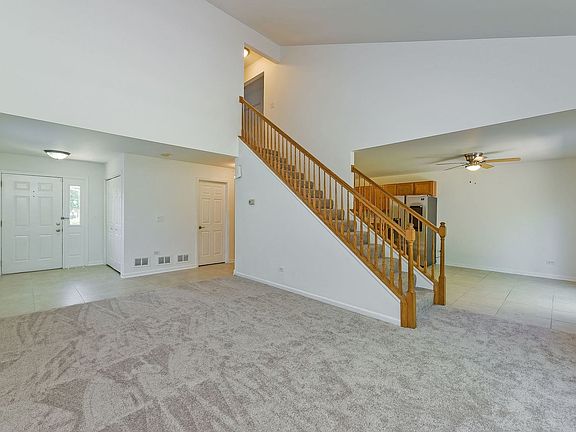 Open to Entryway & Dining Area