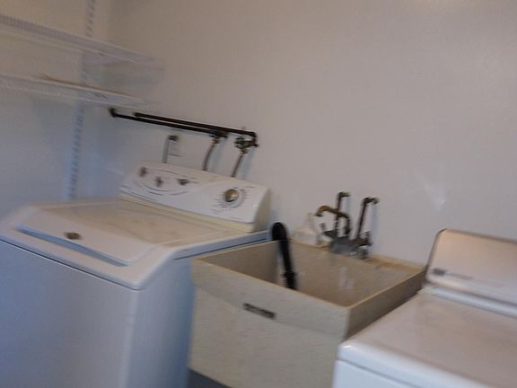 LAUNDRY ROOM, WASHER AND DRYER INCLUDED. HAS EXTRA STORAGE SHELVES!
