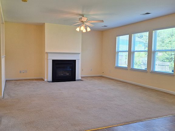 Living room with gas fireplace.