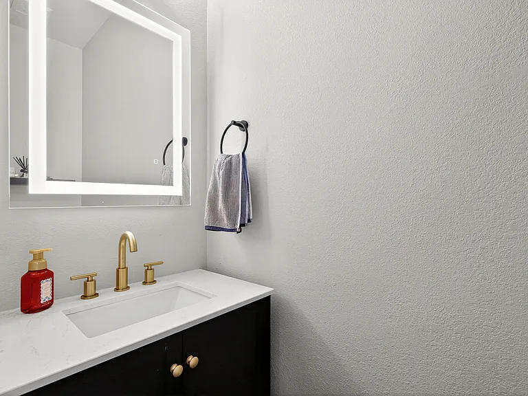 Powder room near the front entrance.