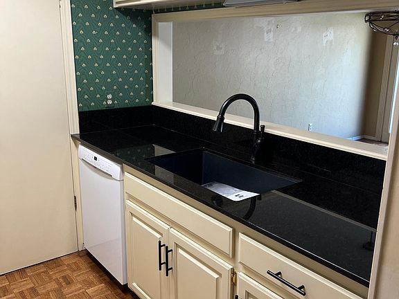 Kitchen farmhouse sink and dishwasher granite countertops