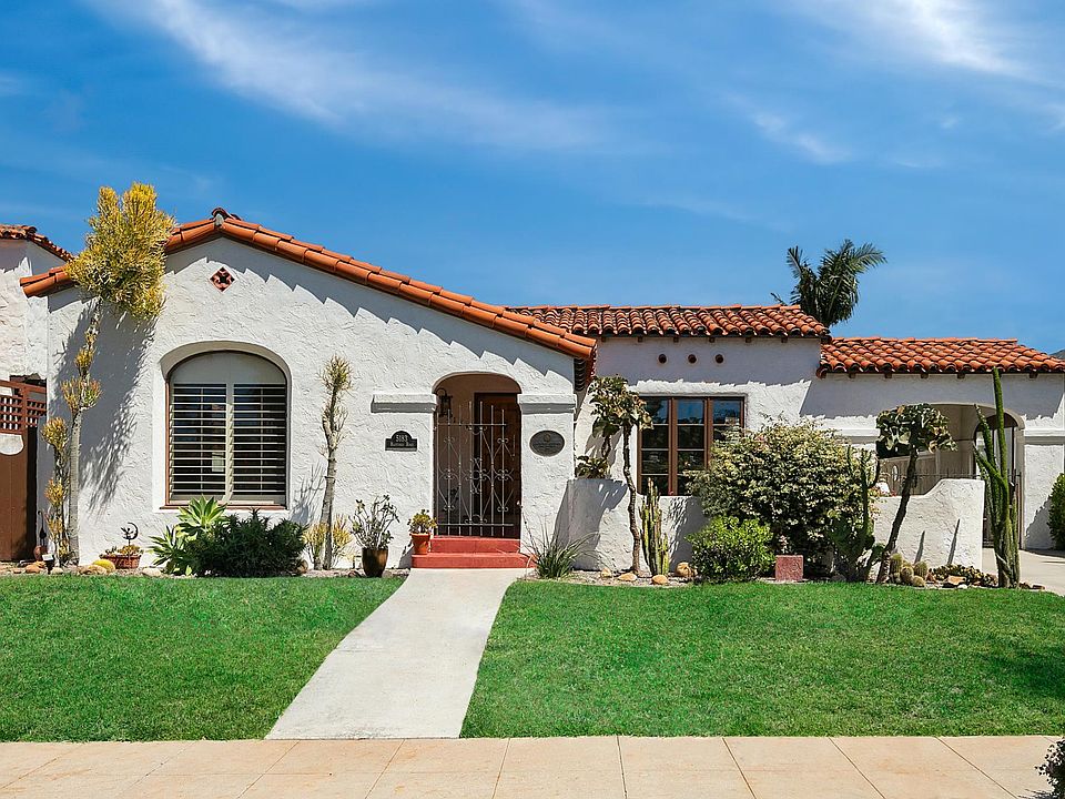 Immactulately maintained 1926 Historic Spanish Revival . 2 car garage at back of driveway.