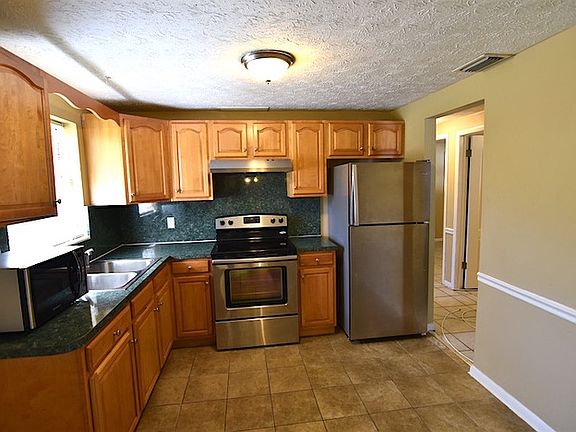 4th image of 6064 John F Kennedy Dr N