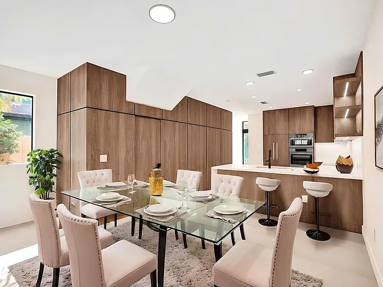 Dining room private window looks at your private walkway with beautiful trees.
