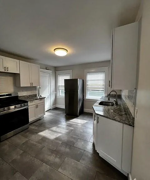 Updated kitchen with stainless appliances and dishwasher
