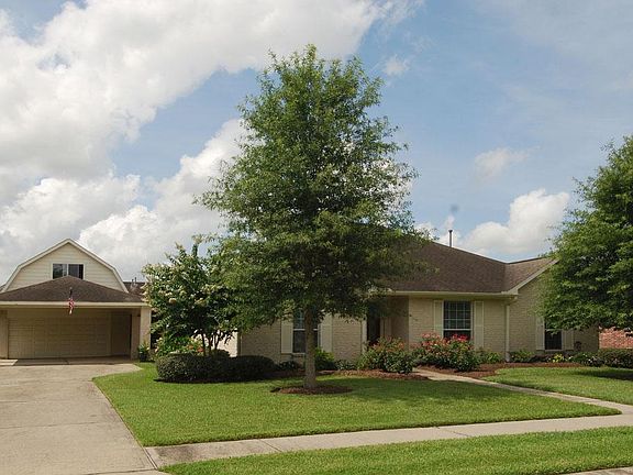 Home boasts the desirable barn garage this neighborhood is known for.