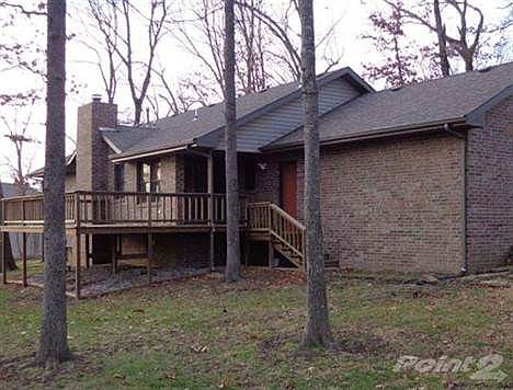 Back of home with large deck, partially covered!