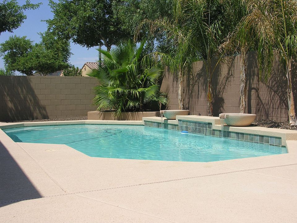 Heated pool with waterfall
