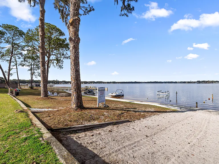 View of the beach, dock and lake