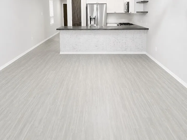 Unfurnished dining room and kitchen