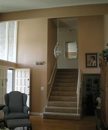 Impressive staircase leads to large master suite