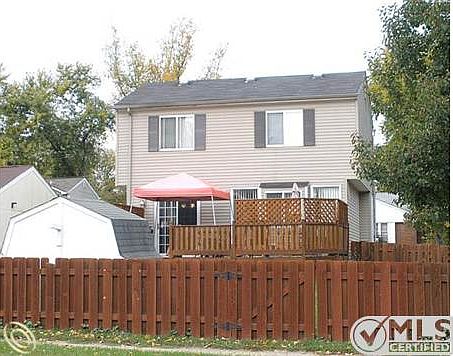 spacious fenced backyard