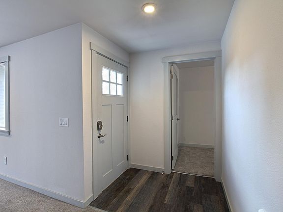 Front door entry, bedroom door open