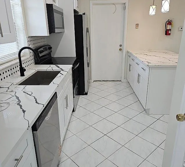 6380 NW 25th Ct — Photo 12
