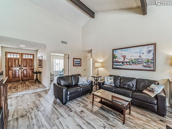 Newport Harbor themed artwork and vintage furniture