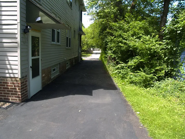 side of house/driveway