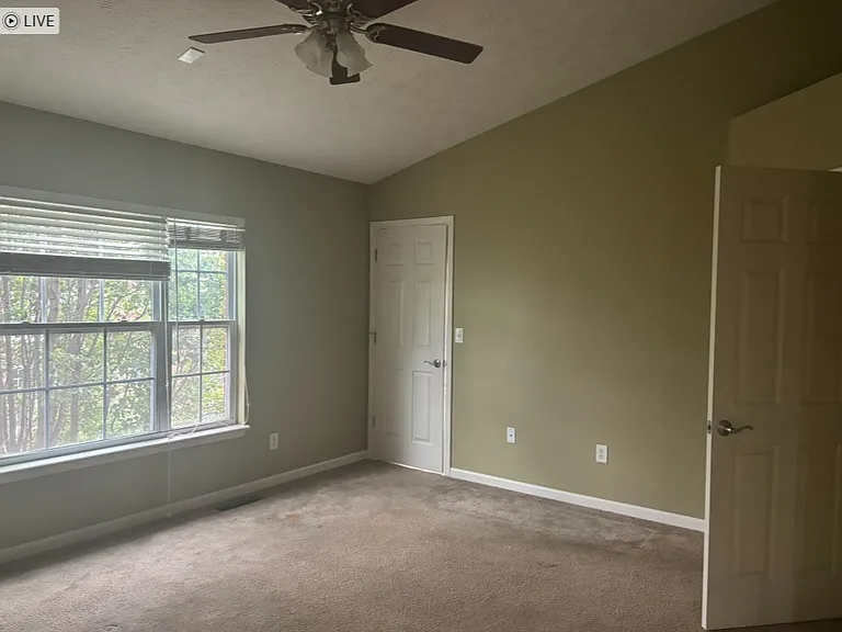 master bath from standing in doorway to bathroom (hallway door is open on right)