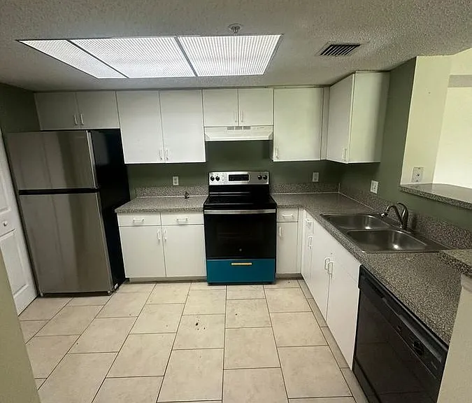 5005 Wiles Rd #102 — Photo 9