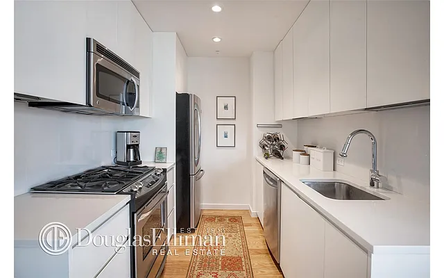 Sold by Douglas Elliman | media 13