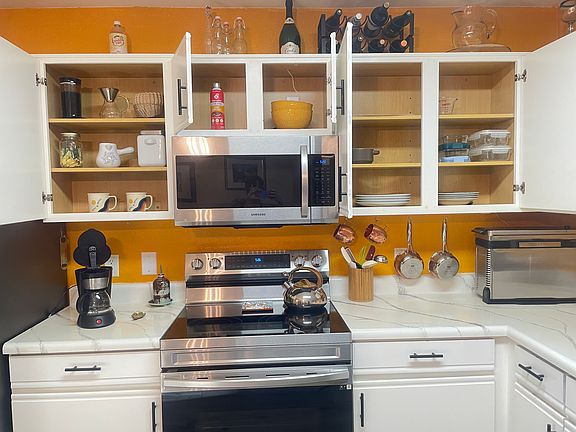 Mostly everything you'll need for your stay. Ninja air fryer, small coffee maker, plates, silverware, fire extinguisher.