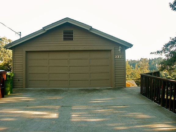 2 car attached garage has interior access and extra storage space