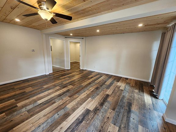 living room facing hallway, bedroom 1