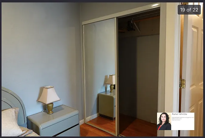 Mirrored Closet in bedroom, next to bathroom