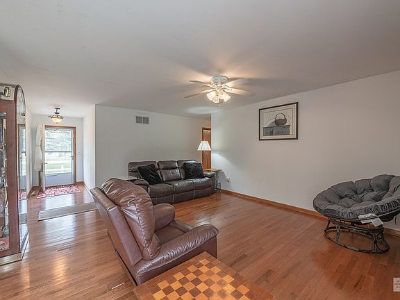 New hardwood floors greet you as you step inside this spacious ranch home.