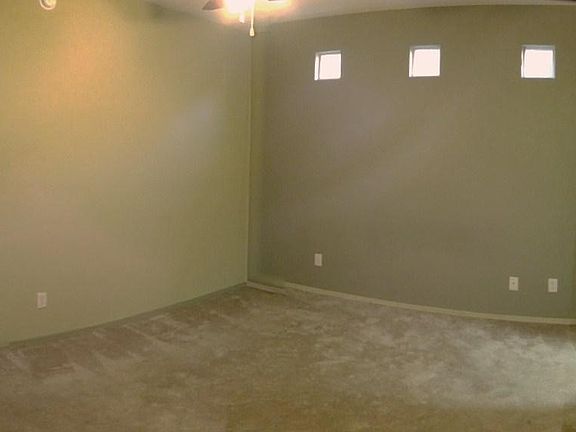 Note: spacious master suite was painted an off-white after photo was taken