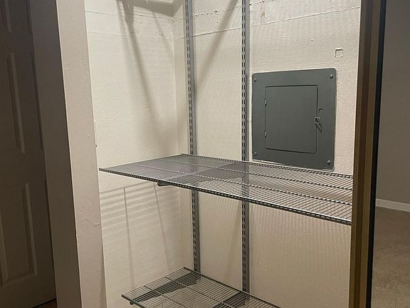 Left hand side of closet with customizable shelving