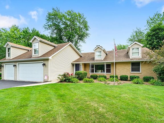 Beautiful landscaping enhances the curb appeal of this home.