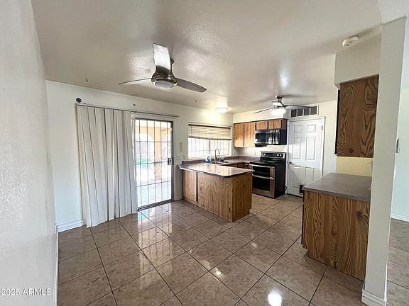 5th image of 6823 W GARFIELD Street