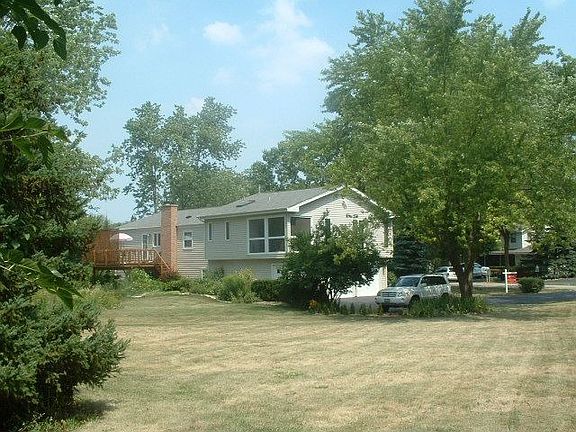 Standing at corner of property