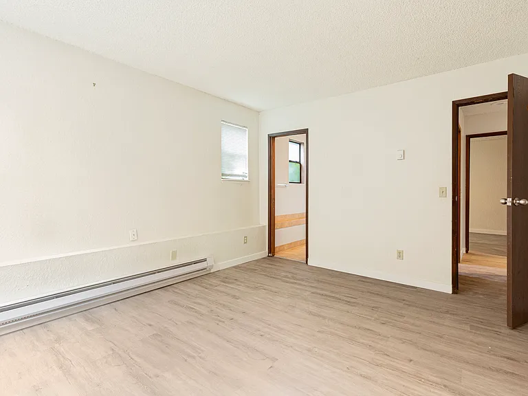 Unit 2 master bedroom with its own access to bathroom