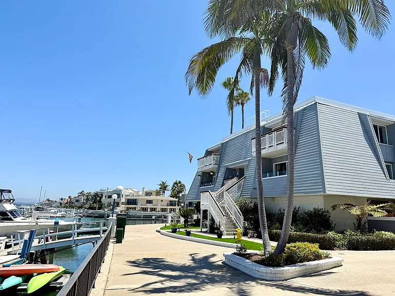 Approach to entrance within Montego Village on waterfront.