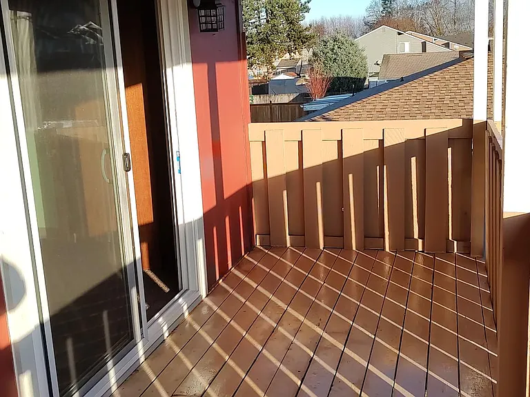 Thi is the covered front deck off the 2nd floor of this unit.