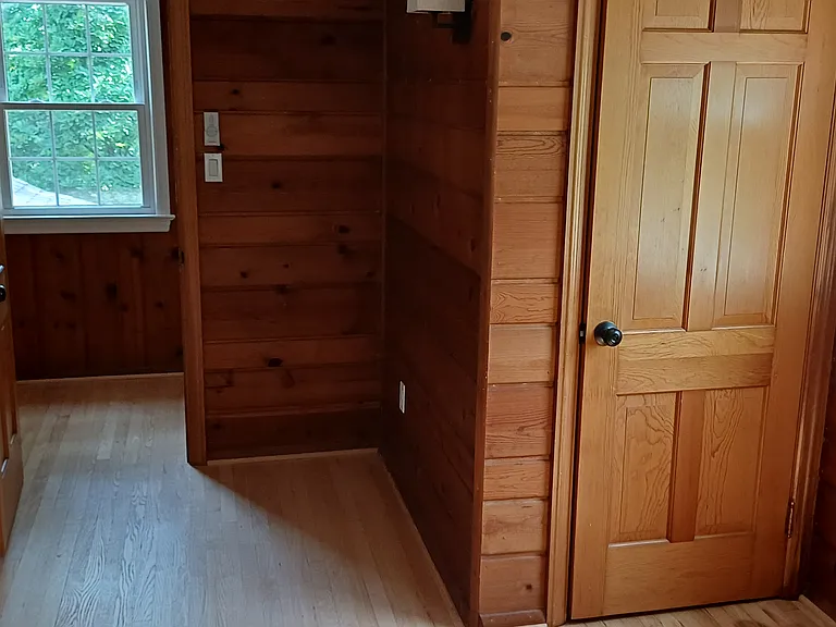 One of 2 closets for smaller bedroom.