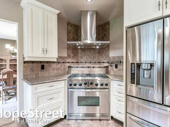 5th image of 63 Quesnell Cres NW