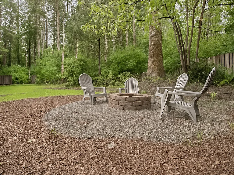 Gather around the firepit under the trees_perfect for stargazing, storytelling, and making s'mores with your crew.